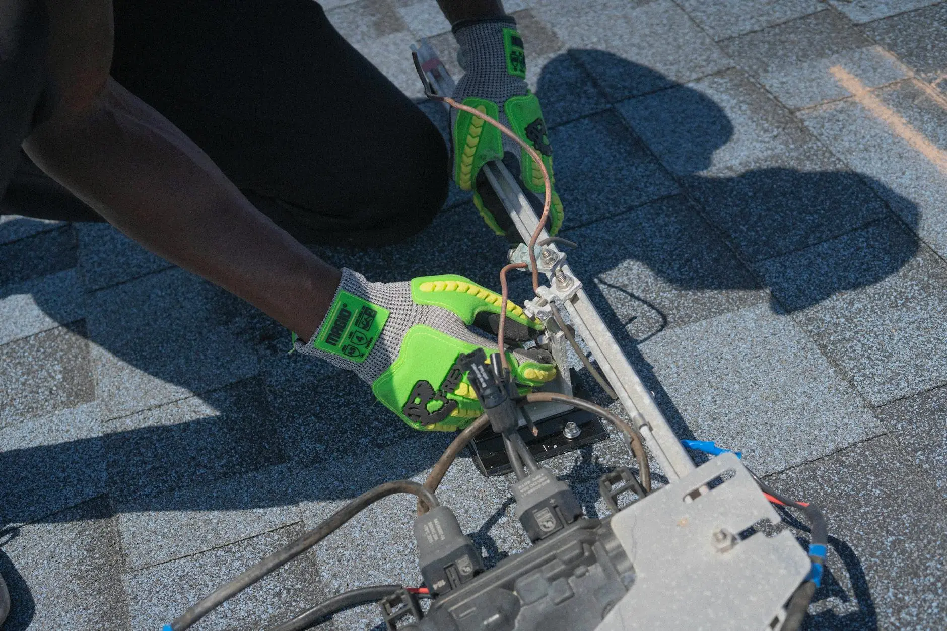 A close-up of high-quality architectural shingles being precisely installed with proper underlayment on a West Jordan home.